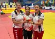 Maryuri Ureña, medallista de oro, campañada de la gerenta de Liga Alejandra Montañés y de la entrenadora Johana Orozco. 