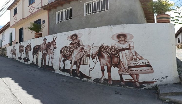 A través de murales, los líderes comunales pretenden perpetuar la historia de Ocaña. En las paredes de las viejas casonas de la calle empedrada del Embudo se deja la huella de ese pasado. / Foto: Cortesía / La Opinión 