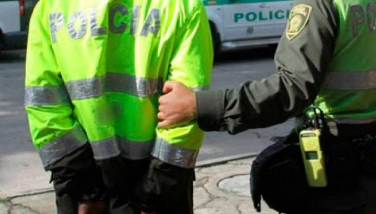 Policía capturado