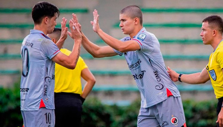 Cristian Álvarez y Manuel Carmona, Real Madrid. 