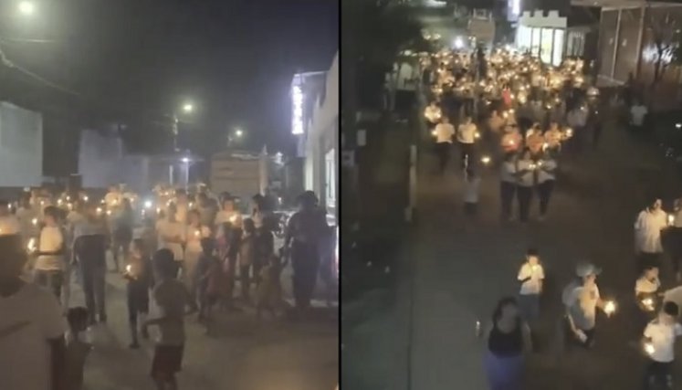 En la vereda Versalles, la comunidad pidió con velas y pancartas, ser alejada del conflicto armado. 