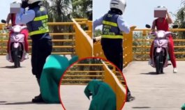 ¡Ni en las películas! Agente de tránsito se escondió bajo una sábana para detectar infractores