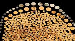 A la venta un tesoro de 700 de monedas de oro halladas en un maizal de Kentucky